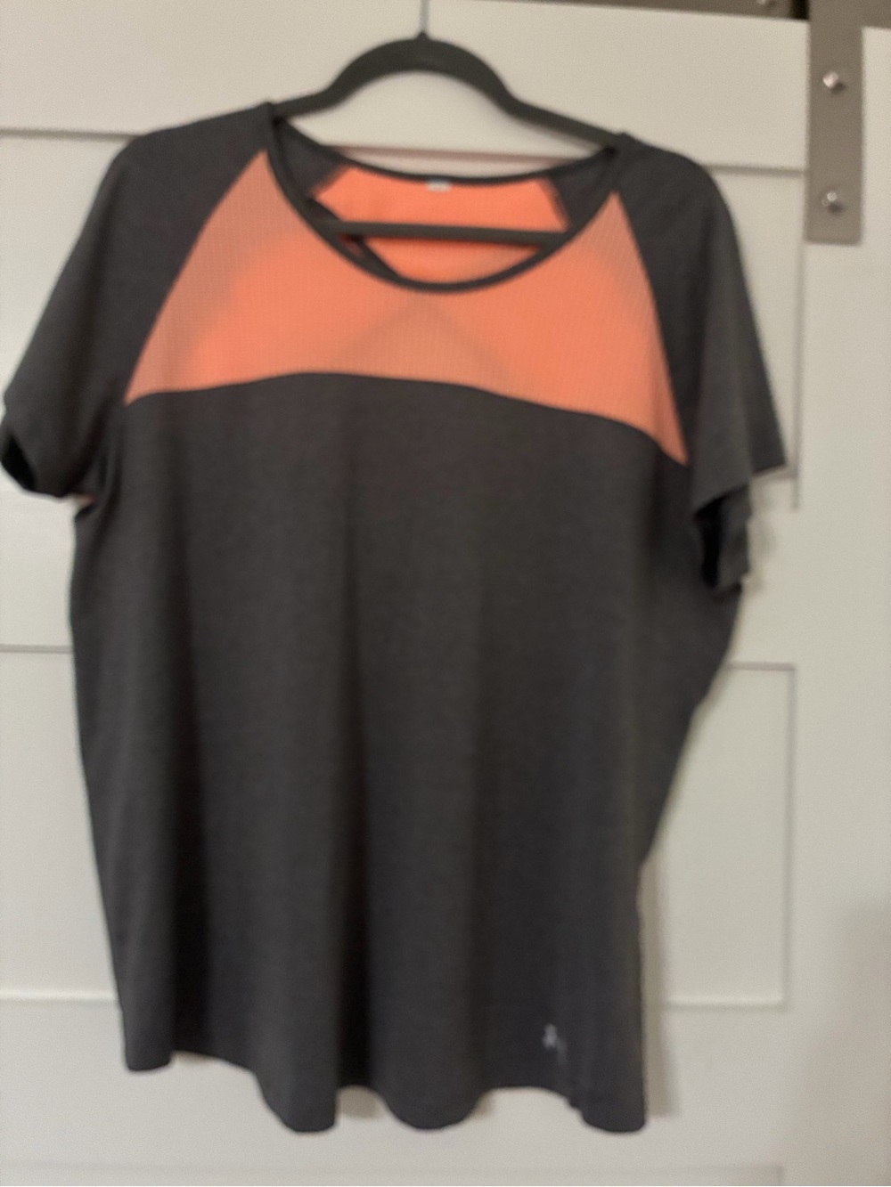 Under Armour Charcoal Short Sleeve Tee with Coral Yoke.